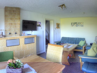 Wohnzimmer mit Kachelofen