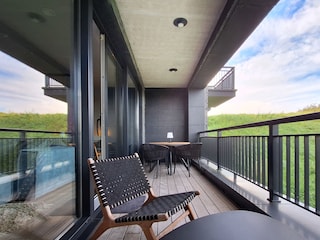 Balkon mit Dünenblick
