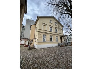 Eingang zur FeWo durch den Torbogen