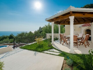 Outdoor dining area with barbecue