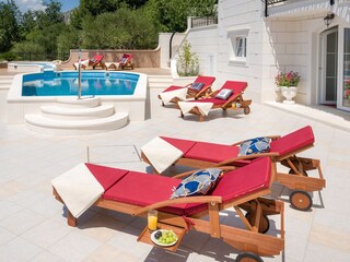 Pool level with the entrance to fitness room, sauna