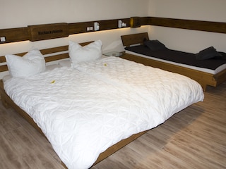 Bedroom 1 with double- and single-bed