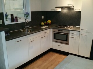 Kitchen with combi microwave