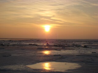Sonnenuntergang am Burhaver Strand