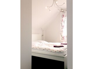 Kleines Schlafzimmer im DG