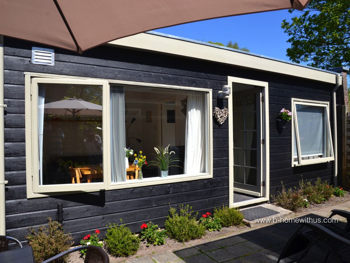 Ferienhaus Het Tuinhuis mit sonniger Terrasse