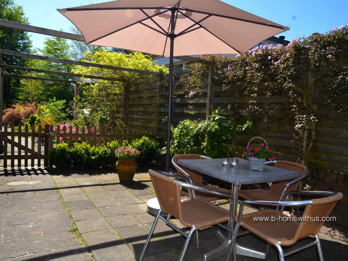 Ferienhaus Het Tuinhuis mit sonniger Terrasse