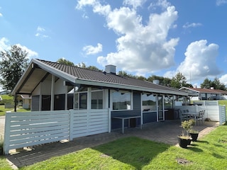 There are cozy terraces on three sides of the house