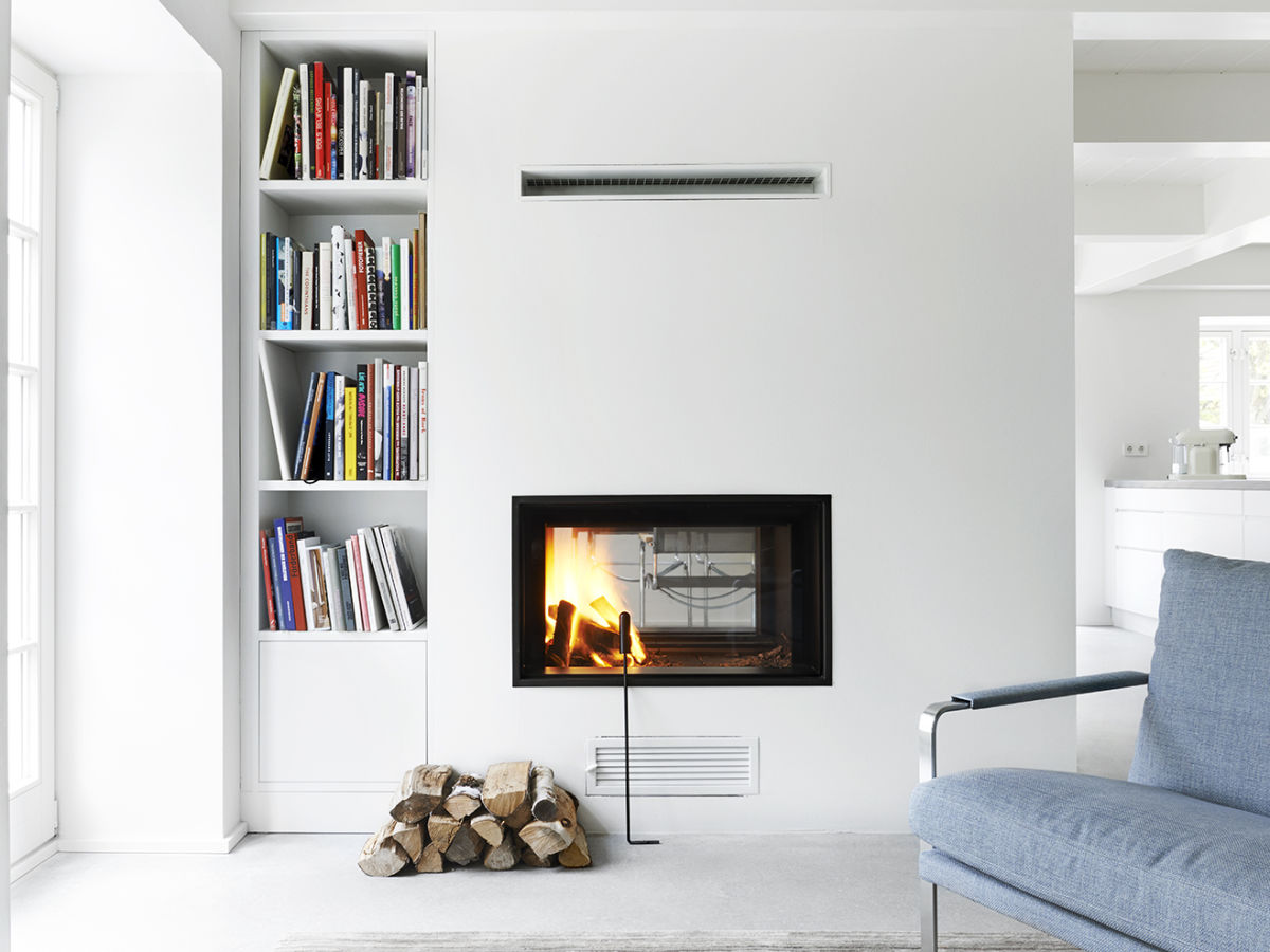 Living room with double-sided fireplace.