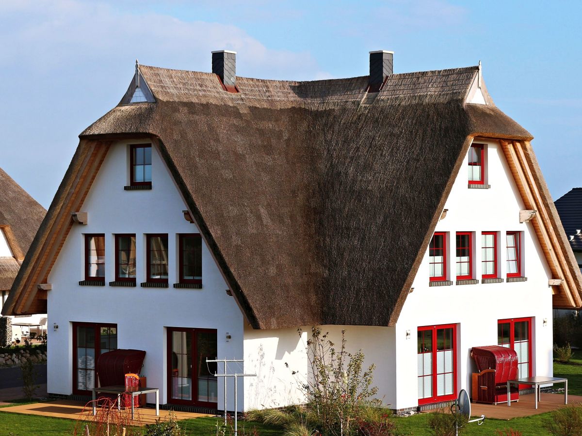 Seestern und Seeperle: Terrassenbereich mit Garten