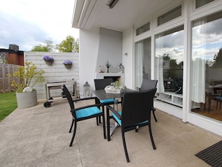 Unsere Terrasse mit Kamin