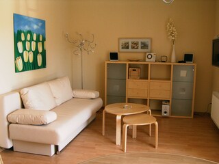 Wohnzimmer mit Schlafsofa