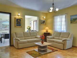 Living room is connected to dining room