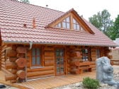 Naturstamm-Ferienhaus