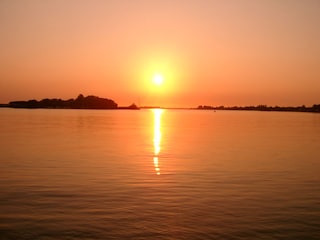 Sonnenuntergang vom Deich aus beobachtet