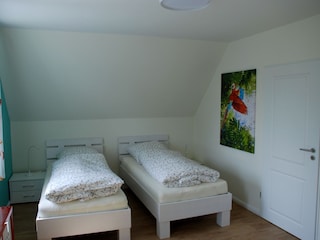 Das Schlafzimmer 2 im Obergeschoss