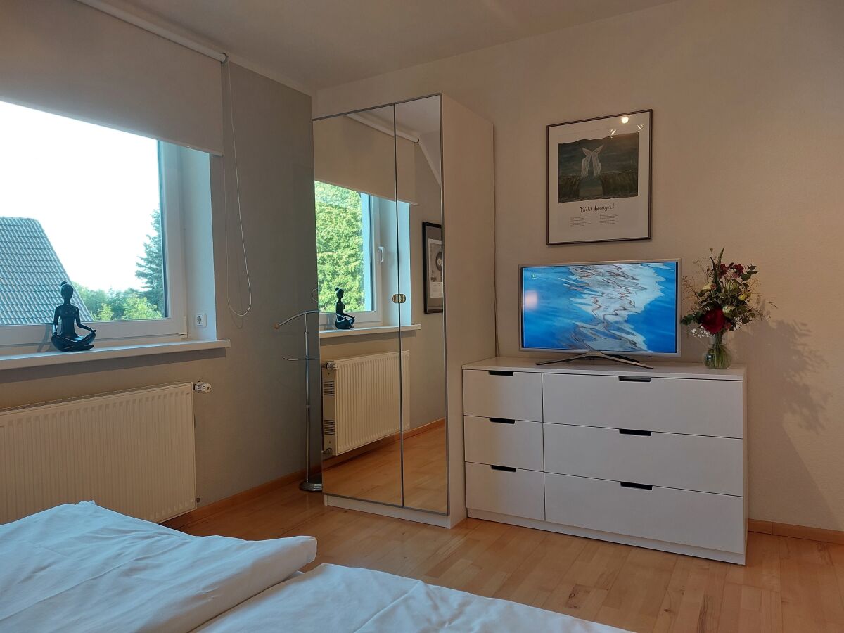 1 Schlafzimmer mit Smart-TV