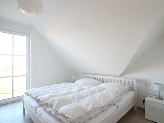 Eins der beiden Schlafzimmer im OG