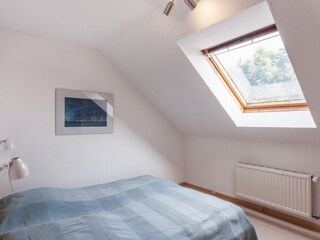 Schlafzimmer mit Doppelbett