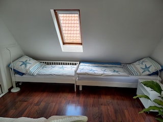 Kinderbett und Einzelbett