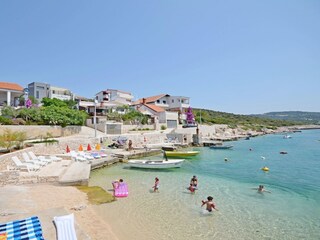 Beach in front of the house suitable for children