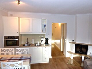 view from the terrace into living room with kitchenette