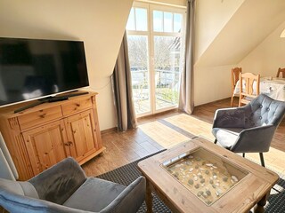 Wohnbereich mit Zugang zum Südbalkon