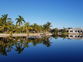 Palm-lined, wide canal with a fantastic view