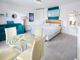 Wohnzimmer mit Sitzecke für 4