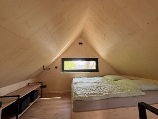 Doppelbett in der Galerie