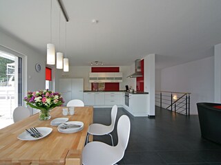 First floor with kitchen, dining room and living room