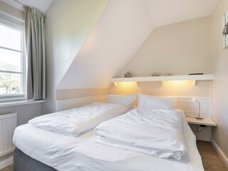 Schlafzimmer neben Bad
