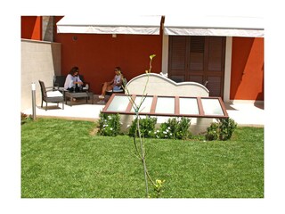 Der Garten mit Liegewiese zum Sonnen