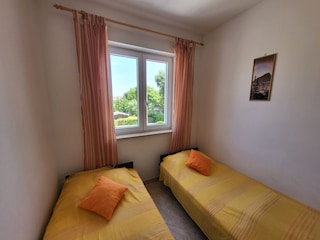 Schlafzimmer mit 1 Bett