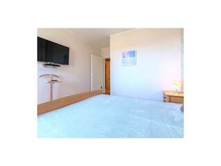 Schlafzimmer und TV