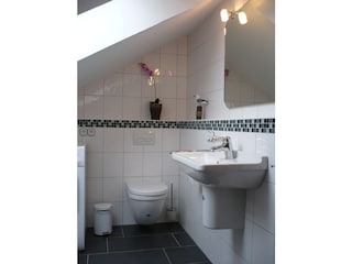 WC mit Wäschetrockner im Obergeschoss