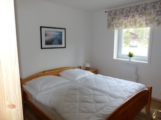 Schlafzimmer mit Doppelbett