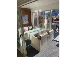 Wintergarten mit Morgensonne.