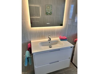 bathroom with shower and toilet