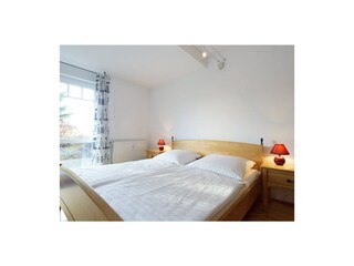 Schlafzimmer mit Doppelbett