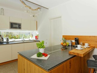 Die offene Küche mit modernster Küchentechnik  lässt keine Wünsche offen