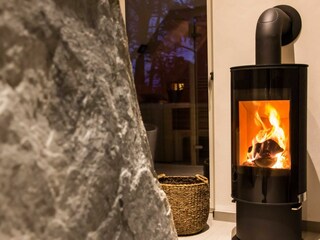 Wellnessbad mit drehbarem Kamin