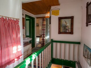 First floor: two showers and a washing basin