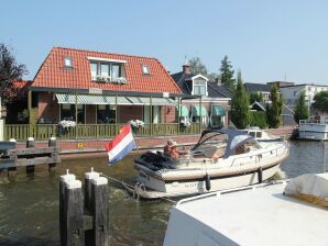 Holiday house Attractive holiday home by the water - Delfstrahuizen - image1