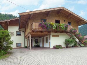 Apartment Ferienwohnung mit Gemeinschaftspool in Waidring - Waidring - image1