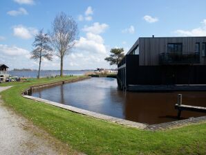 Appartement de charme avec jetée à Langweer - Boornzwaag - image1