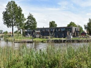 Charmantes Apartment in Langweer mit Bootssteg