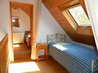 Gallery with single bed