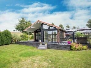 Chalet Sfeervol vakantiehuis met een groot terras nabij de Oosterschelde - Kattendijke - image1