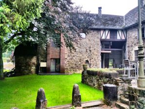 Mansion in Robertville near forest